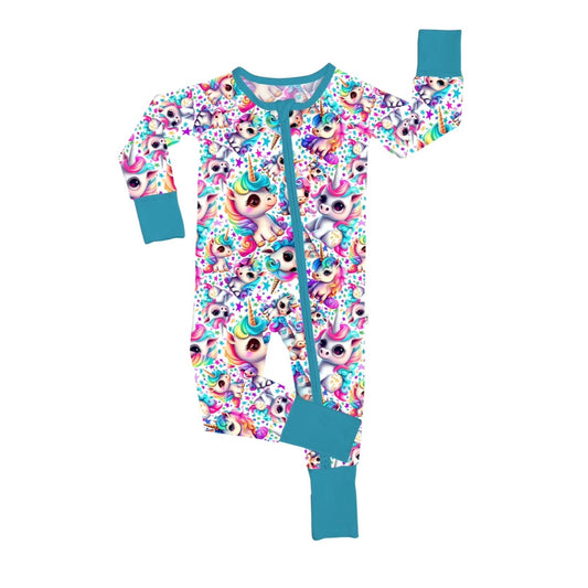 The Mythical Unicorns • Bamboo Zippy (Updated Fit) is a soft, bamboo one-piece pajama for kids with turquoise cuffs and zipper, perfect for sensitive skin. It features unicorn faces, stars, and rainbows on white; left sleeve and right leg outstretched.