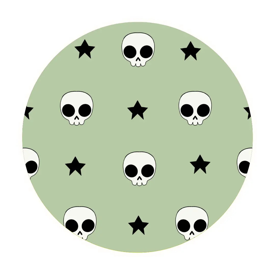 The Rad Skelly • 2 Piece Bamboo Set (Classic Fit) features a green circle design with white skulls and black stars in a playful, evenly spaced pattern inspired by super stretchy fabric.