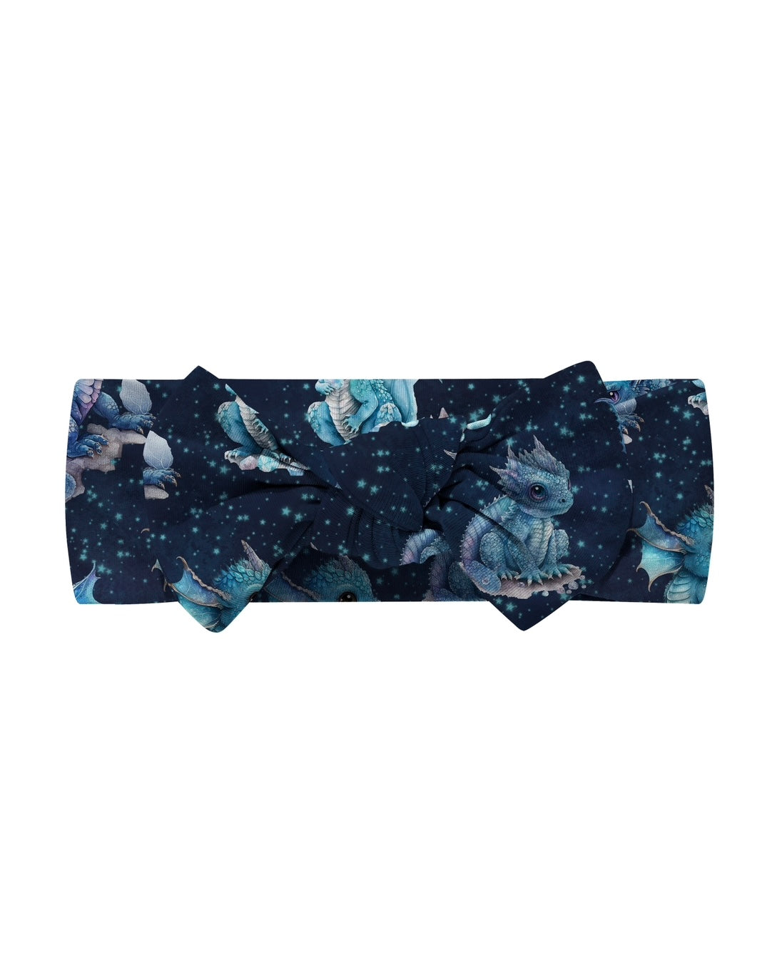 The Dreamy Dragons • Bow Headwrap is a dark blue stretchy fabric headband decorated with cute blue dragons and stars, finished with a stylish topknot bow at the front.