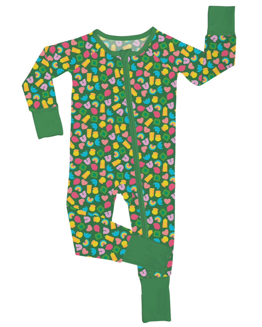 The Charms • Bamboo Zippy (Updated Fit) is a green footless one-piece pajama made from soft bamboo, featuring bright abstract shapes, green cuffs, and a front diagonal zipper for easy changes—perfect for sensitive skin.