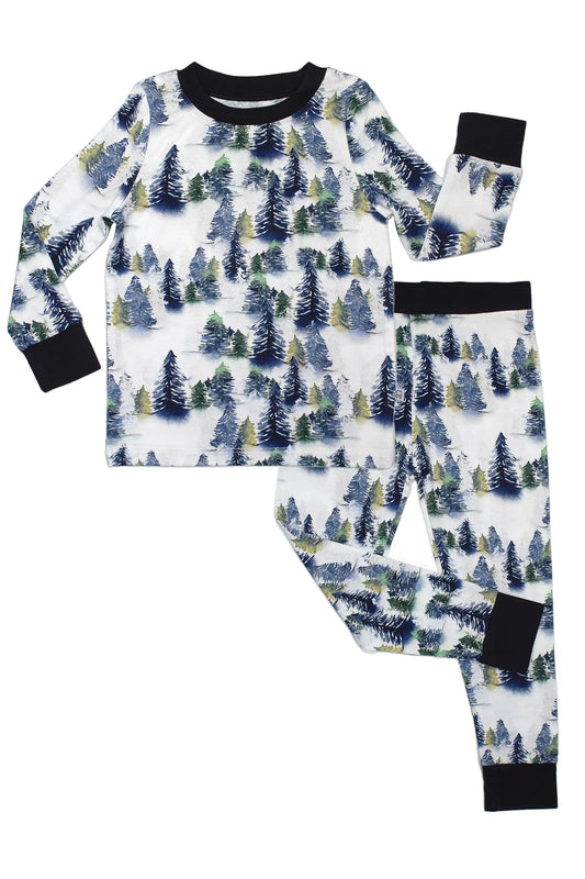 The Snowy Trees • 2 Piece Bamboo Set (Updated Fit) is a children’s pajama set with long sleeves and pants, crafted from soft bamboo viscose for sensitive skin, featuring green, blue, and yellow trees on white with black cuffs and collar.
