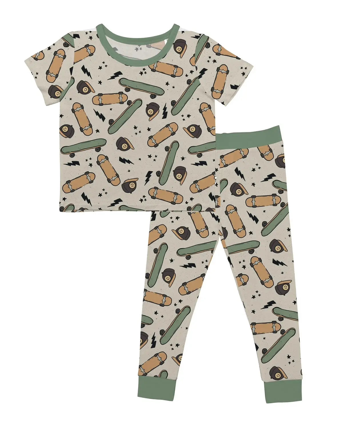 The Skater Vibes • 2 Piece Bamboo Set is a cream childrens pajama set with short sleeves and long pants, featuring an all-over skateboard print and green trim. Made from super stretchy bamboo fabric, its perfect for sensitive skin.