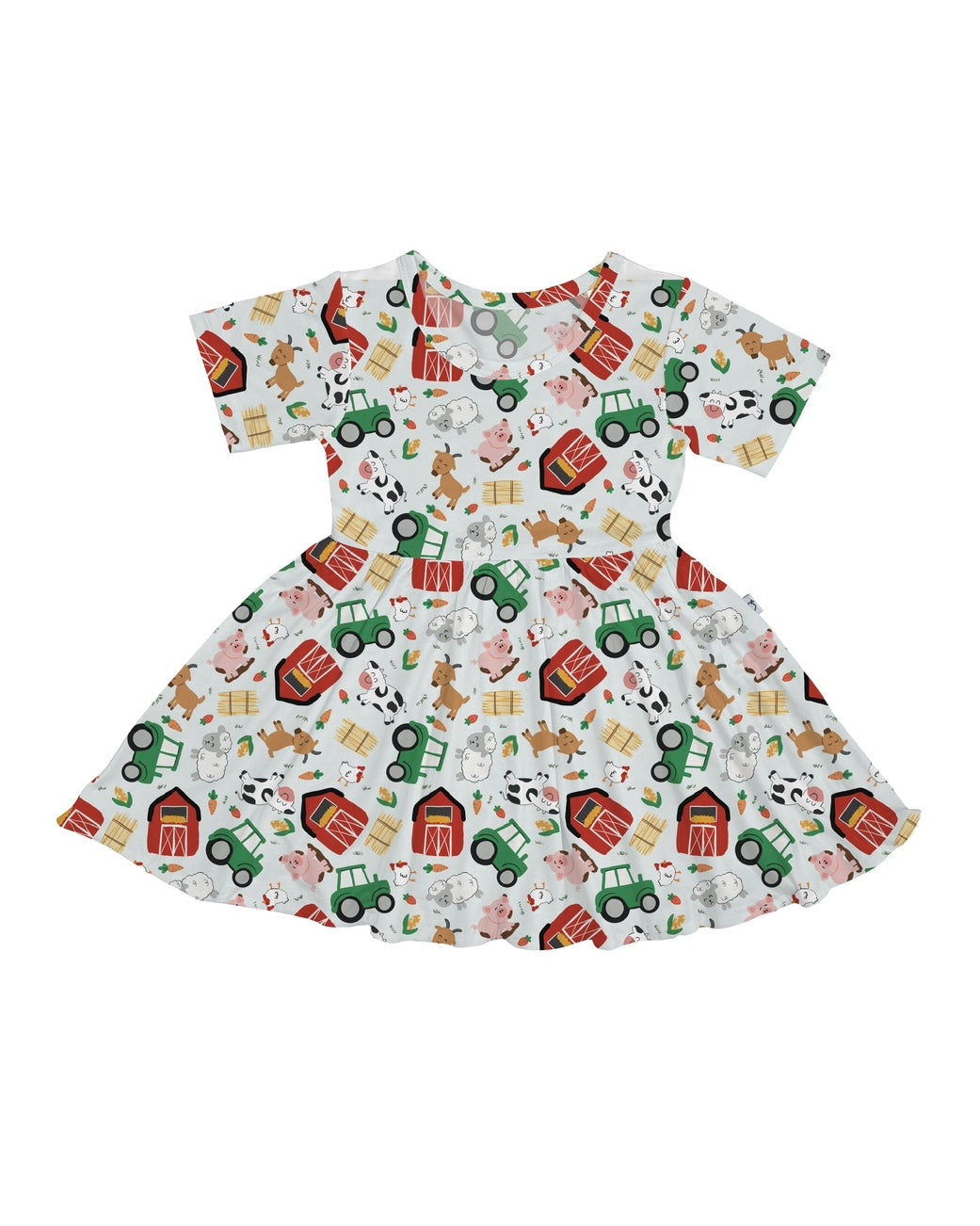 The Tractor Trails • Twirl Dress features a playful farm print with tractors, barns, cows, pigs, sheep, chickens, and hay bales on white. Made of bamboo with short sleeves and a flared skirt—perfect for spinning fun.