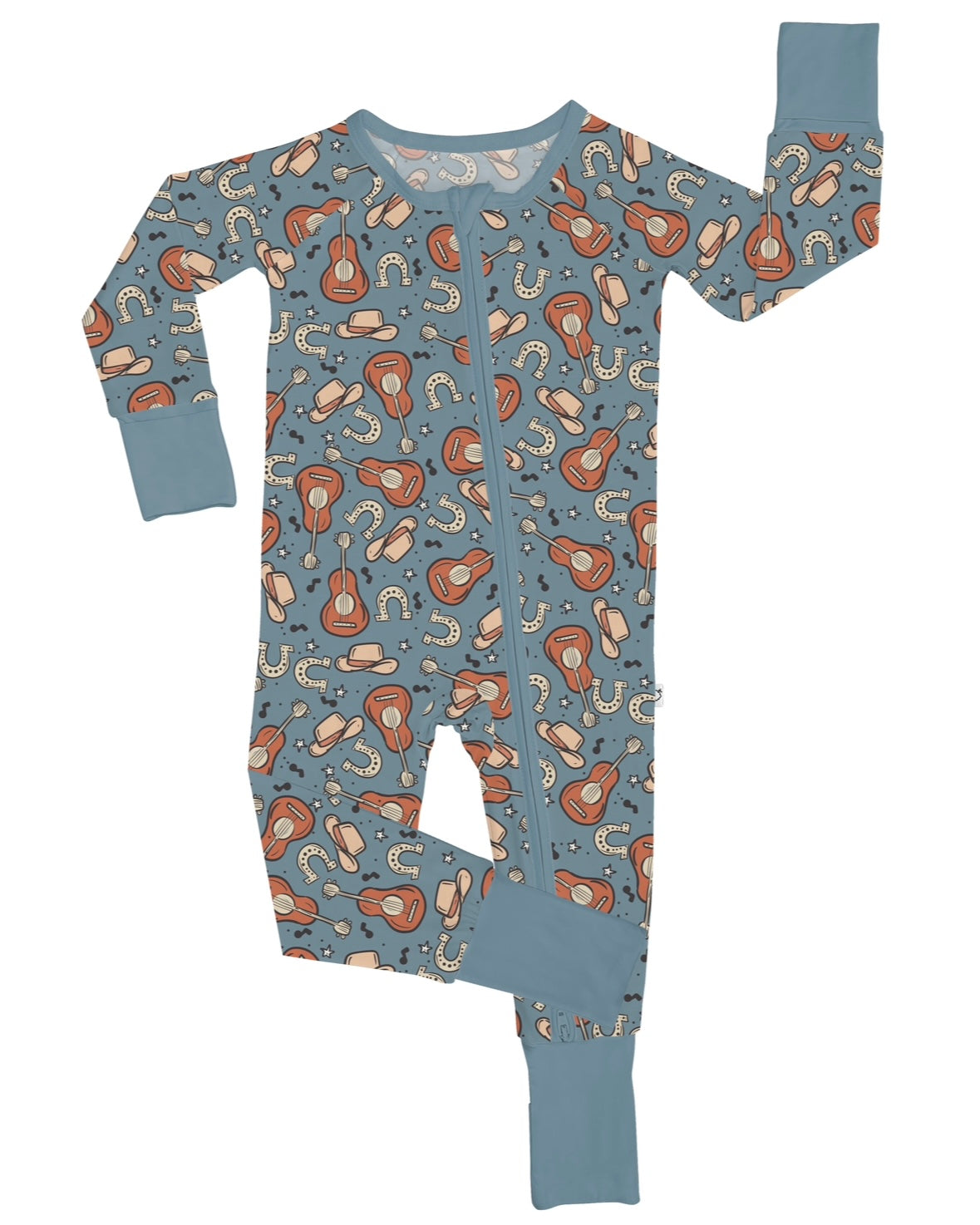 The Howdy • Bamboo Zippy (Updated Fit) is a blue footless baby sleeper with light blue cuffs and an all-over print of guitars, cowboy hats, boots, horseshoes, and stars in brown, beige, and white. Features a convenient front zipper.