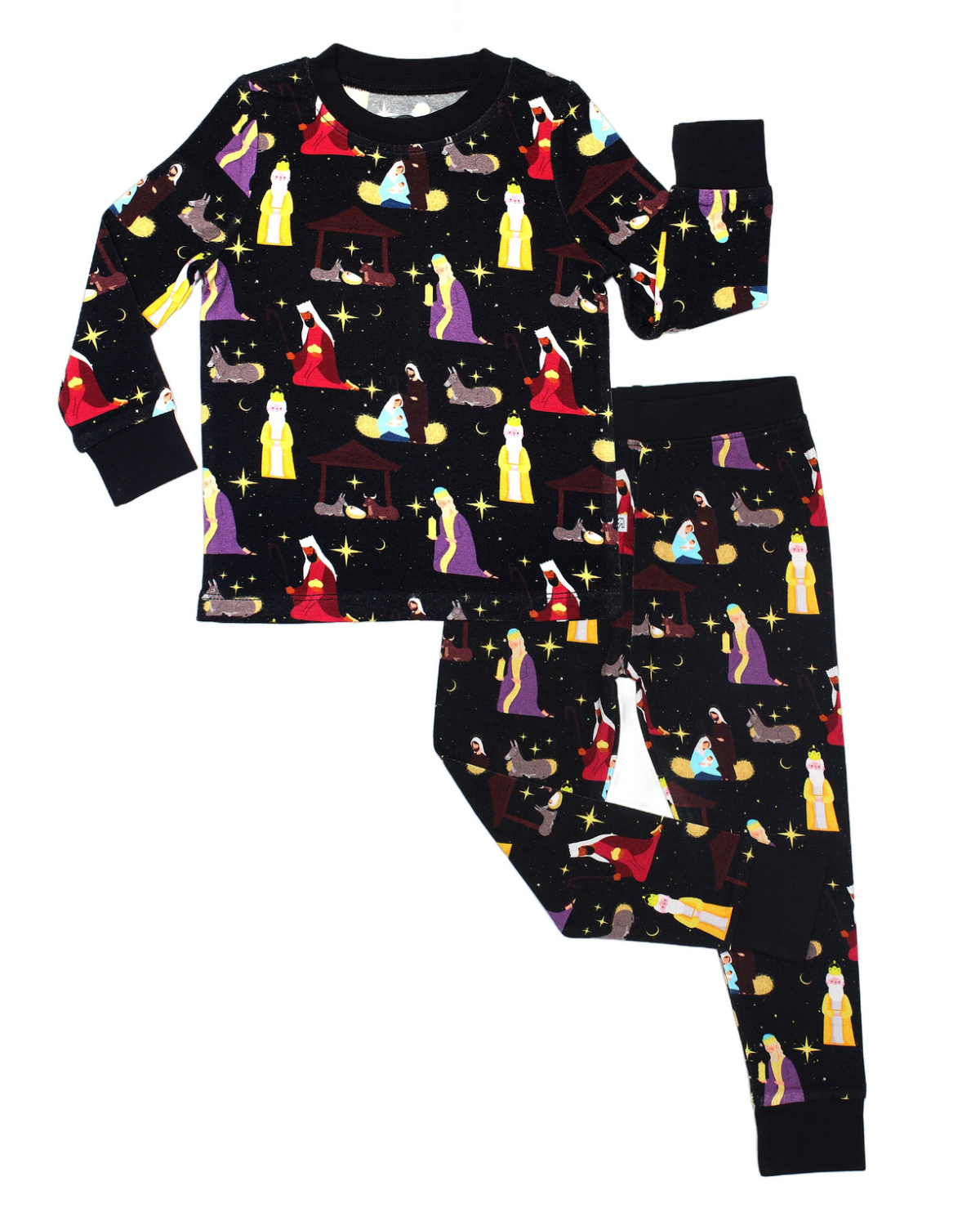 The Nativity Scene • 2 Piece Bamboo Set (Updated Fit) is a stretchy, long-sleeve pajama set for kids, featuring a repeating pattern of Mary, Joseph, baby Jesus, wise men, animals, stars, and mangers on soft black bamboo fabric.