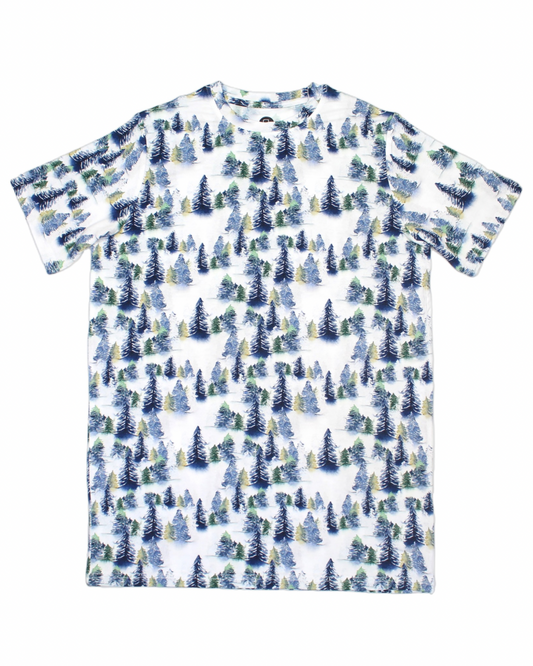 The Snowy Trees • Unisex Bamboo Tee is a short-sleeved white shirt with watercolor-style green and blue evergreen trees, crafted from soft bamboo—ideal for sensitive skin. Shown laid flat against a white background.
