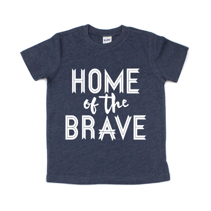 The Home of the Brave • Navy Kids Tee features bold white HOME of the BRAVE text on the front and is made to order from super-soft fabric for maximum comfort.
