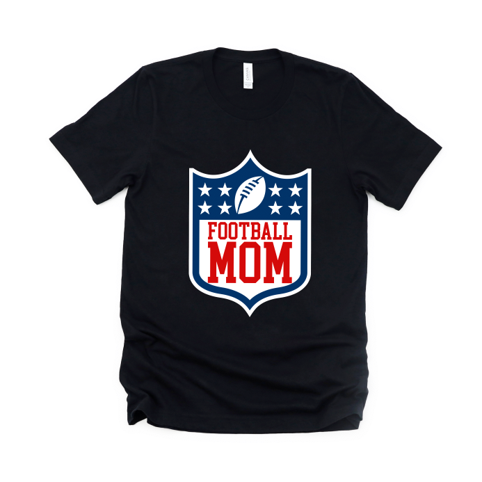 Football Mom • Black Tee Shirt from the Sports Mom Collection features a shield with stars, football, bold red and white Football Mom print on front, and a comfy Bella/Canvas unisex fit.