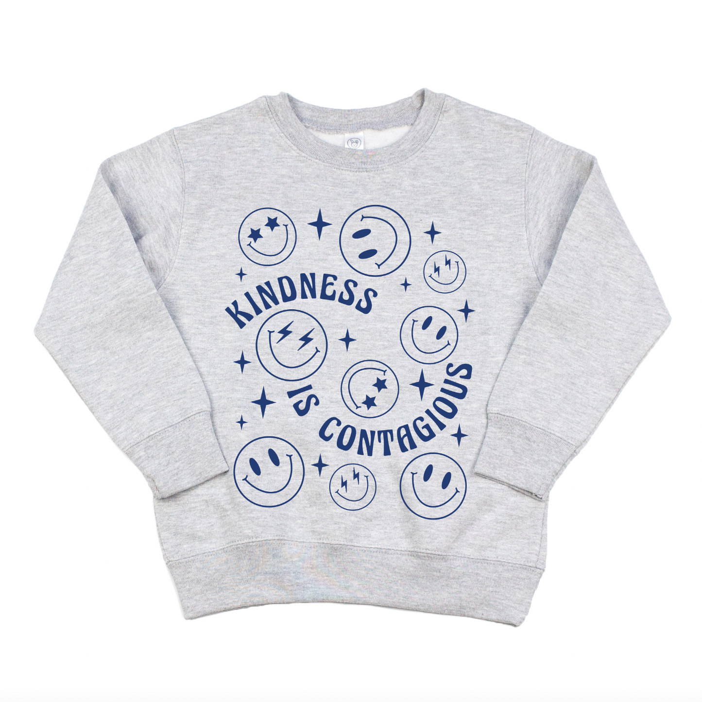 The Kindness • Kids Pullover is a light gray sweatshirt with blue smiley faces, stars, and Kindness is Contagious in a playful font. Unisex sizing offers a comfy oversized fit—perfect for kids’ clothing collections.