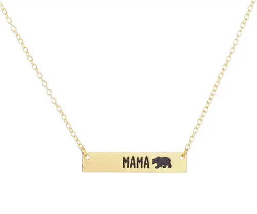 The Mama Bear • Bar Necklace features a horizontal bar engraved with MAMA and a bear silhouette, available in silver or gold, and includes an adjustable clasp for a perfect fit.