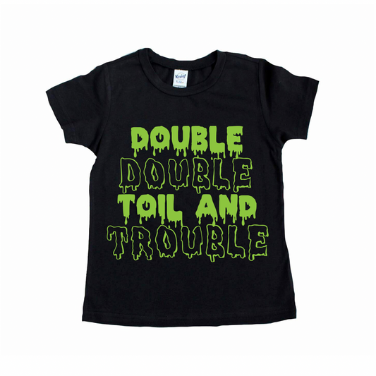 The Toil & Trouble • Kids Tee is a black unisex shirt featuring bold green dripping DOUBLE DOUBLE TOIL AND TROUBLE text—perfect for kids and matching sibling outfits. Shop small for standout style!.