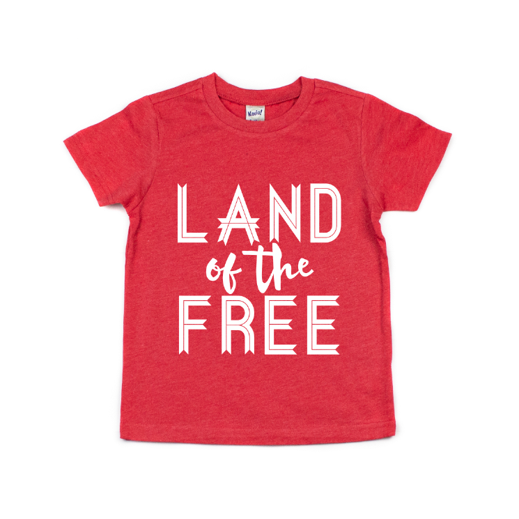 The Land of the Free • Kids Tee is a red short-sleeve shirt with large white text on the front, made from soft combed ring-spun cotton for comfort and a unisex fit, produced with socially conscious manufacturing.