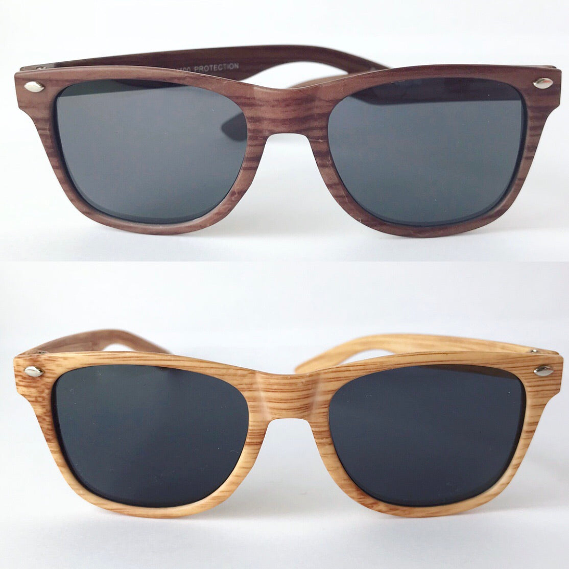 Two pairs of Marbled Sunnies • Kids with dark lenses are displayed on a white background. The top pair has darker marbled frames, while the bottom is lighter. Both feature a classic wayfarer style—perfect for stylish kids!.