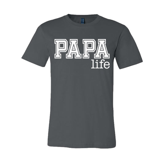 The Papa Life • Gray Tee is a dark gray unisex essential t-shirt, made in Michigan from soft combed and ring-spun cotton, featuring PAPA life in bold white letters across the chest.