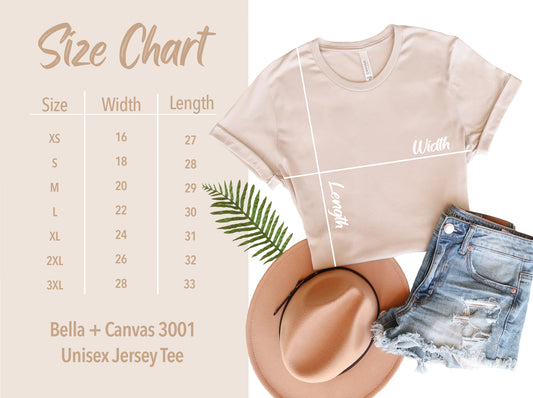 Size chart for Hot Mom Summer • Storm Tee unisex fit, sizes XS–3XL, with width and length measurements. Chart shown with a beige t-shirt, hat, denim shorts, and a fern beside it.