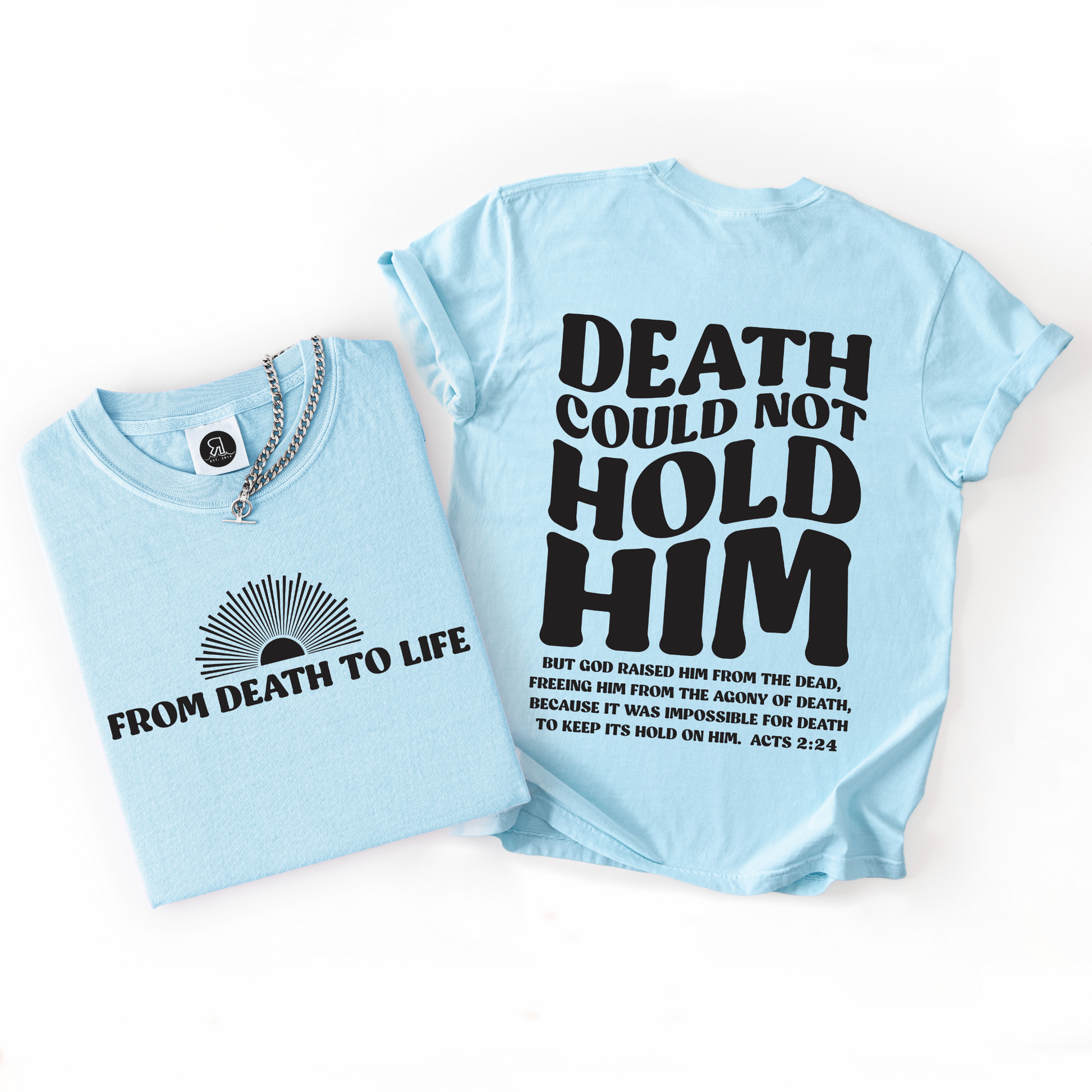 Light blue t-shirt with black text on a white background