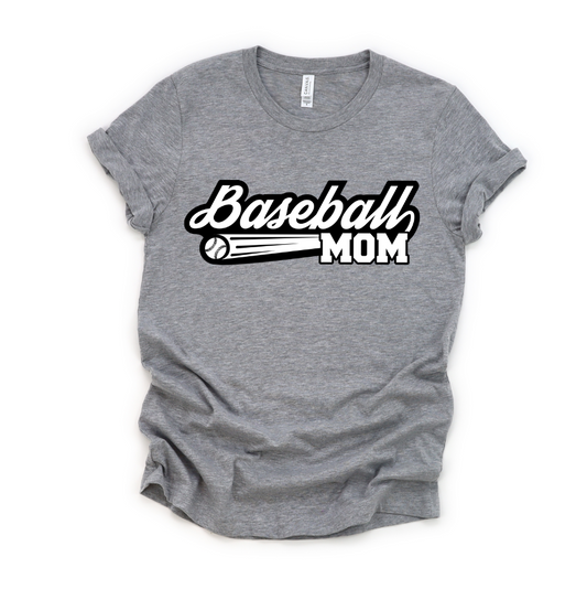 The Baseball Mom Tee is a unisex gray shirt featuring Baseball MOM in bold black and white letters, accented with a baseball graphic and motion lines highlighting the word Baseball.